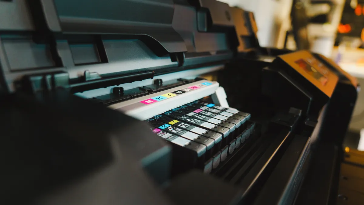 Open printer showing ink cartridges