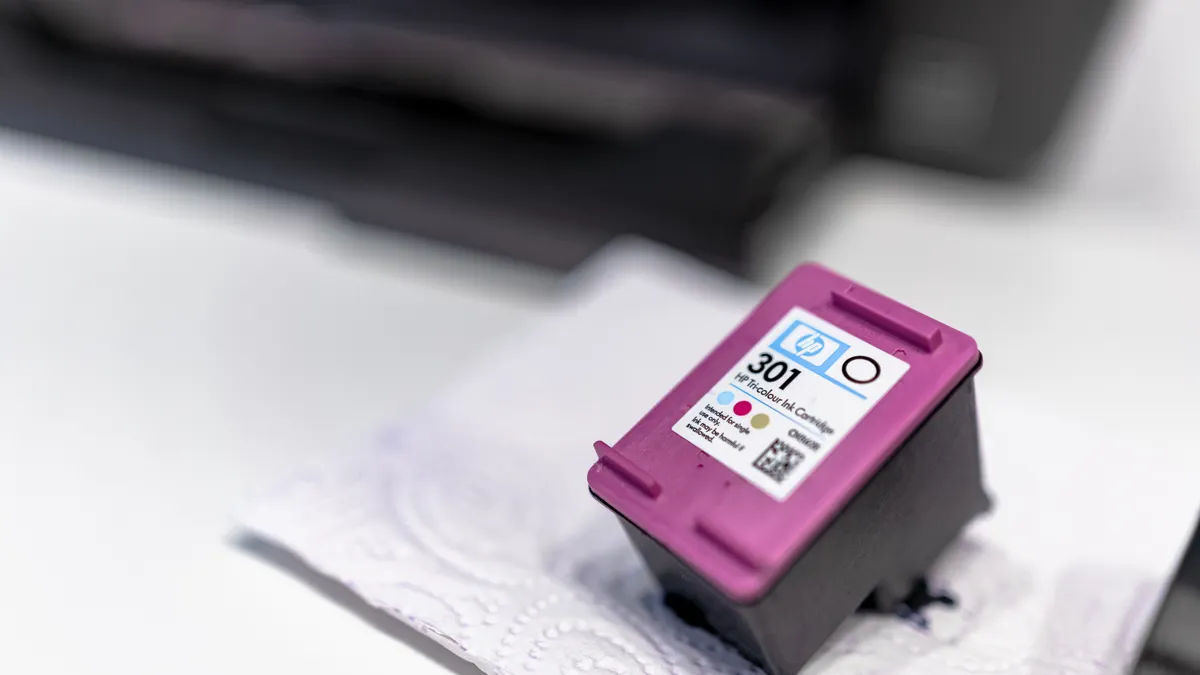 Printer setup checklist before you start Purple printer ink cartridge on a surface